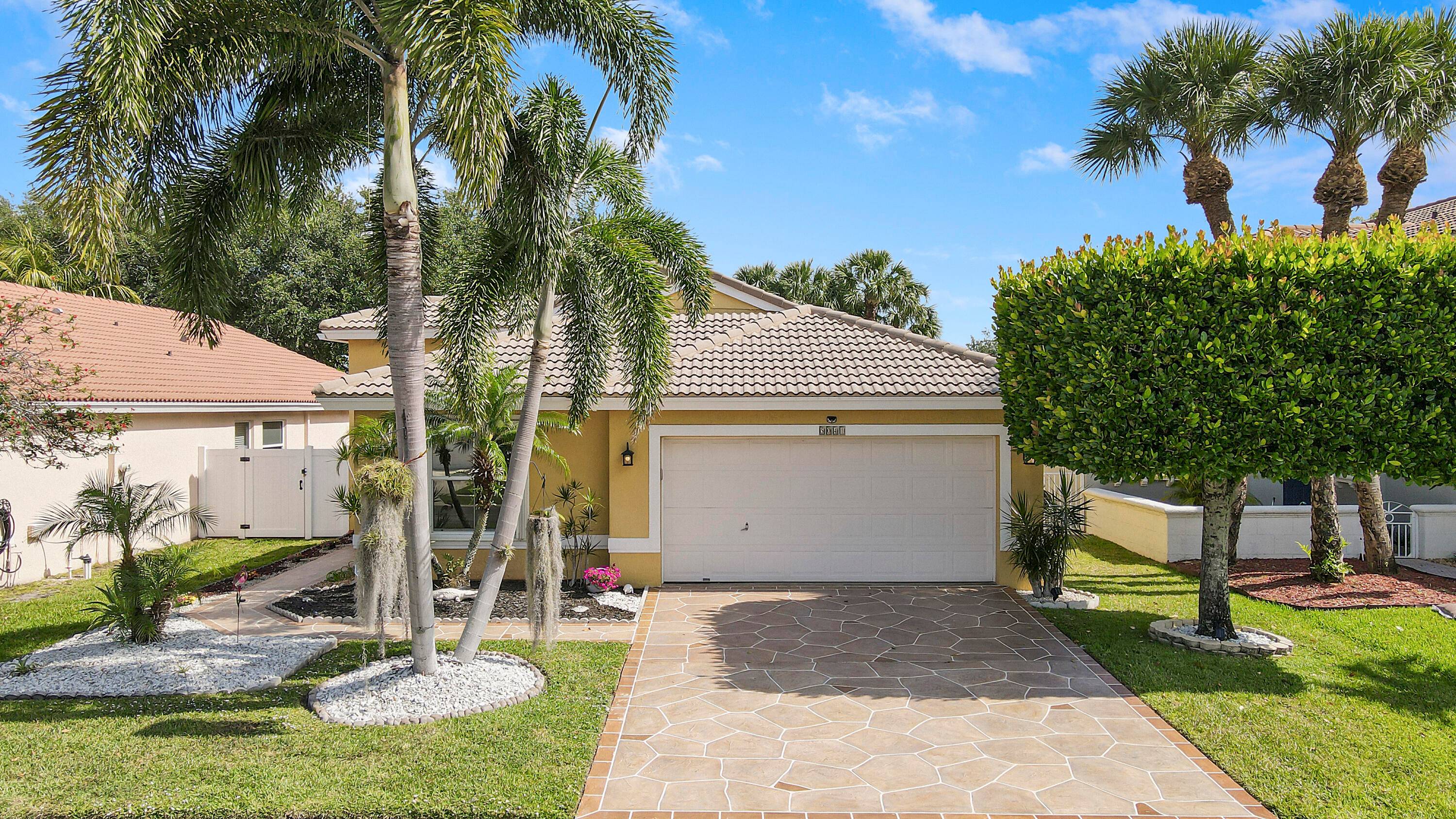 Meticulously maintained 3 Bedroom, 2 Bathroom CBS home with character and elegance !