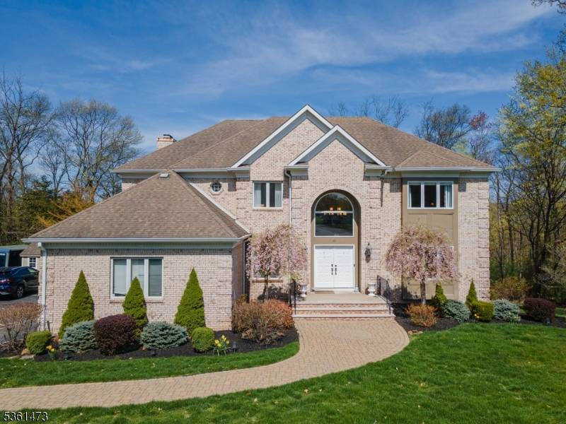 Welcome to your dream home in the highly sought after High Ridge Estates of Towaco !