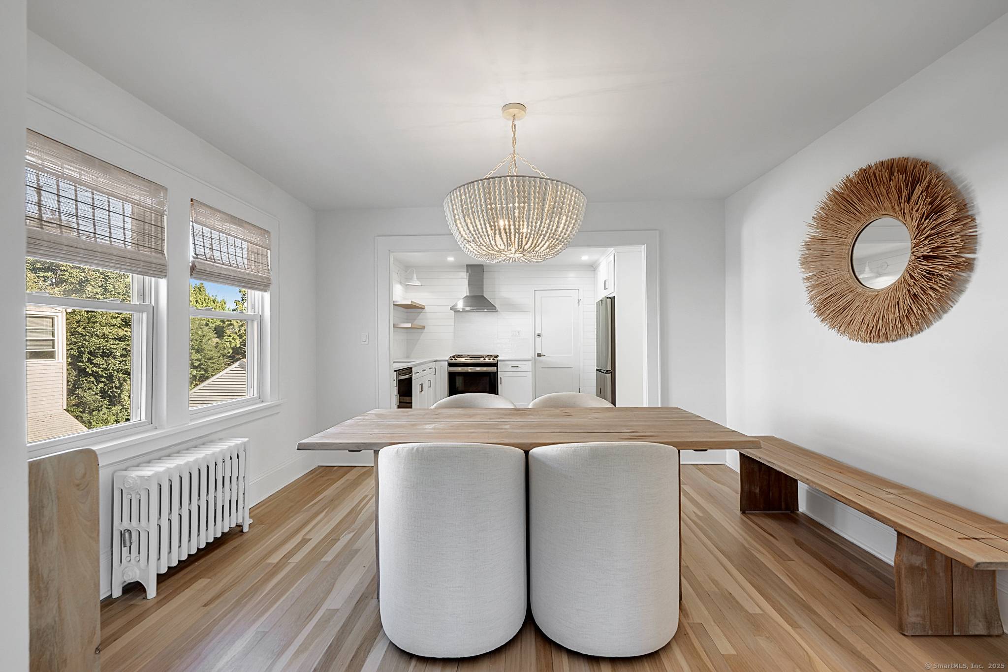 Discover the perfect blend of comfort and modern living in this fully renovated two family home, ideally located within walking distance to the picturesque area of St.