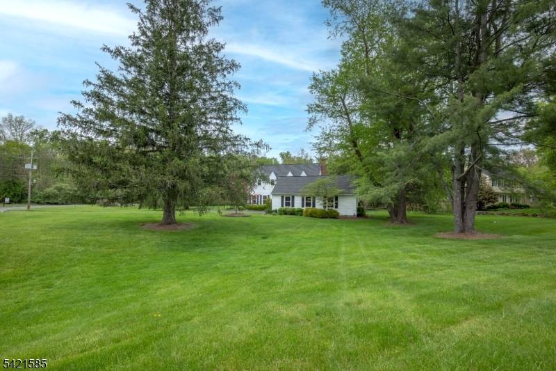 Lovely 4 bedroom, 2 1 2 bath Center Hall Colonial on approx 1 acre situated on the end of a quiet street in a special neighborhood.
