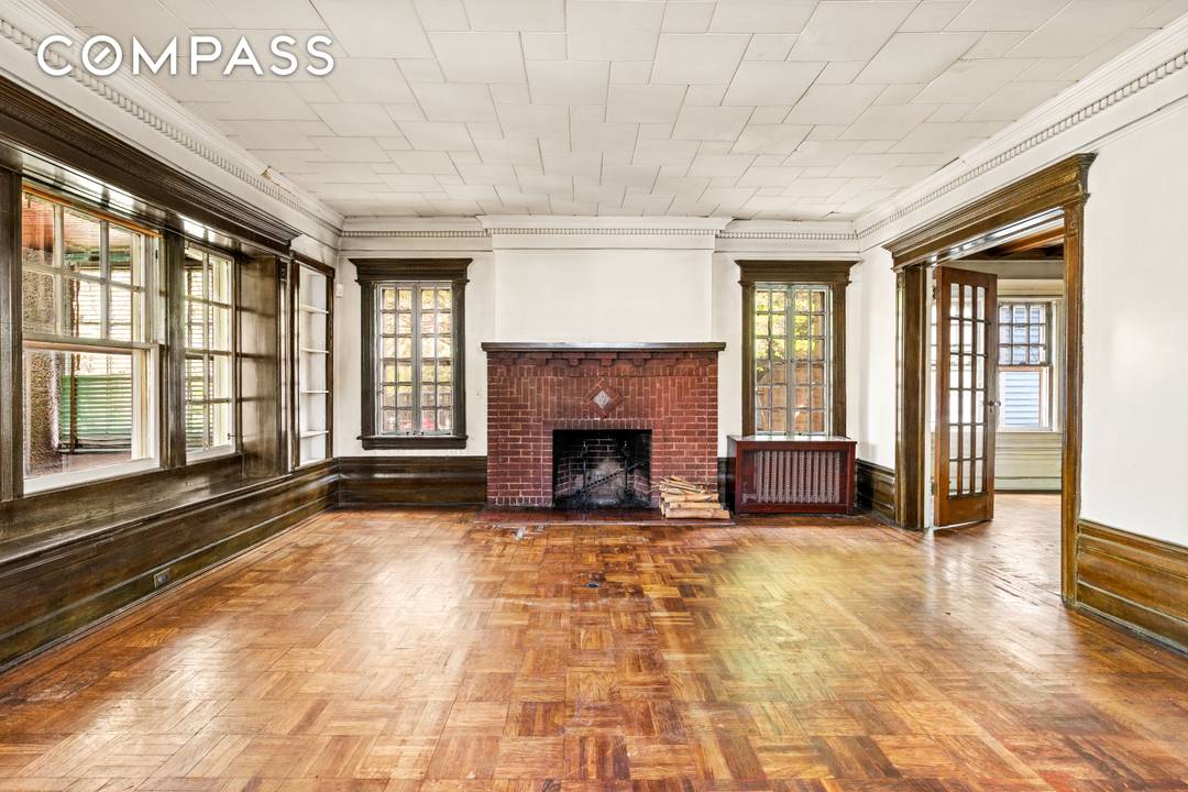 Tucked away at the end of a quiet cul de sac on a bucolic, tree lined street in the heart of historic Ditmas Park, this enchanting five bedroom Victorian offers ...