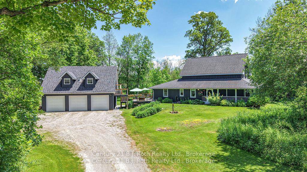 This extraordinary Century home is set on over 18 acres of peaceful, natural landscape.