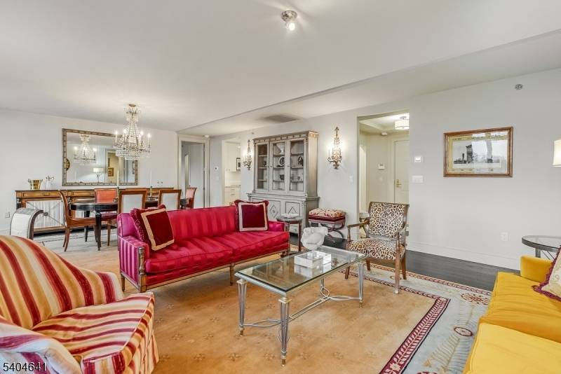 Indulge in an extraordinary quality of life within this remarkable 1, 835 square foot residence, which commands breathtaking vistas of South Mountain Reservation.