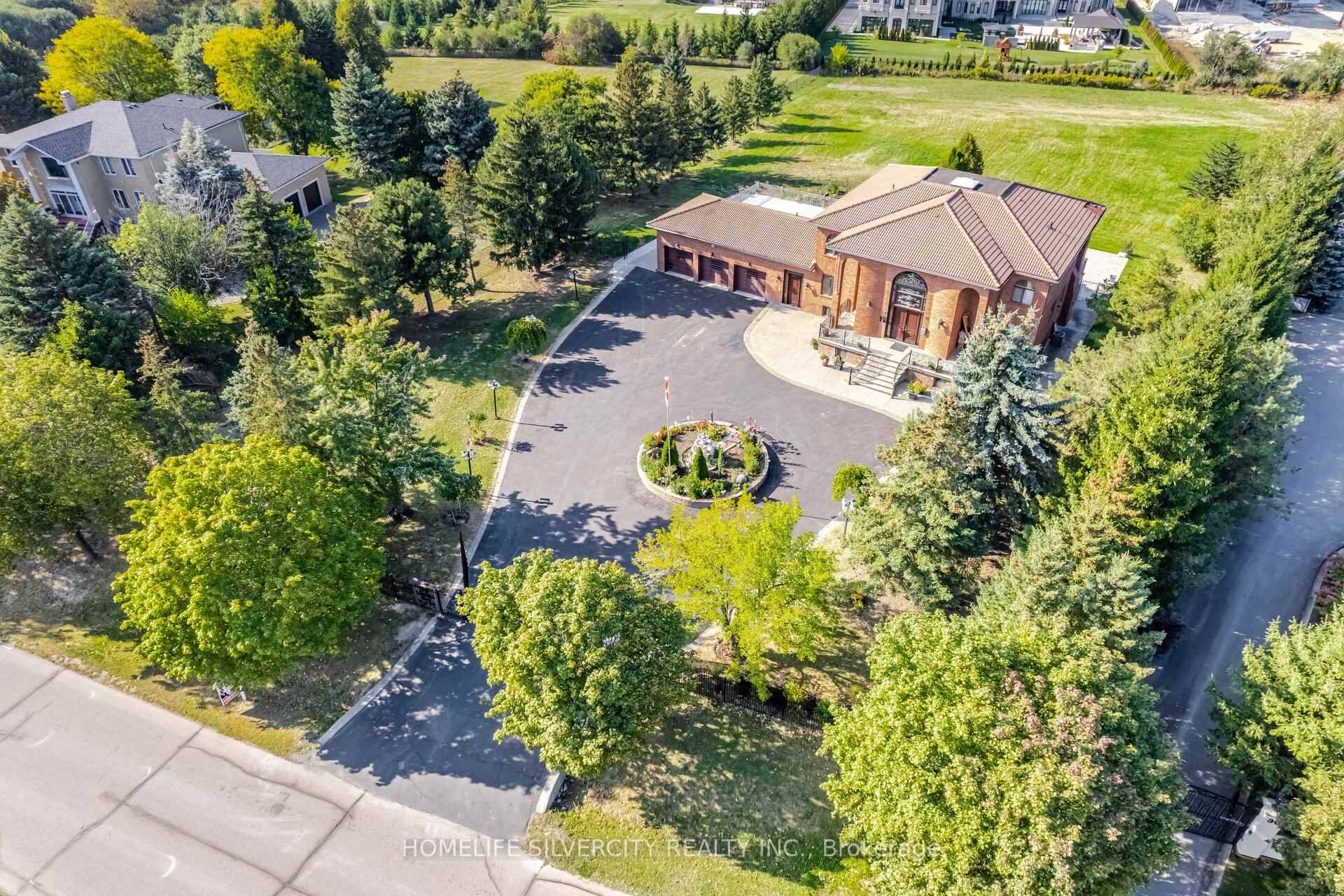 Custom Built Estate Home Located On 2 Acres Lot With 3 Car Garages.