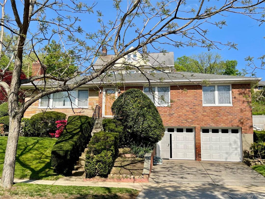 Nestled in the coveted heart of Douglaston, this beautifully renovated pristine ranch home steps away from the Manor, Little Neck Bay and parks.
