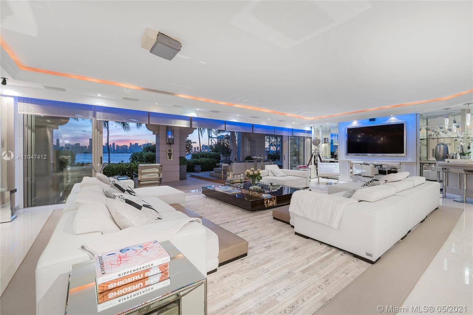 Minimum 2 year lease. This fully furnished ground floor Bayview unit offers the best of Fisher Island with unobstructed views to Biscayne Bay Downtown Miami Skyline, plus amazing sunset views.