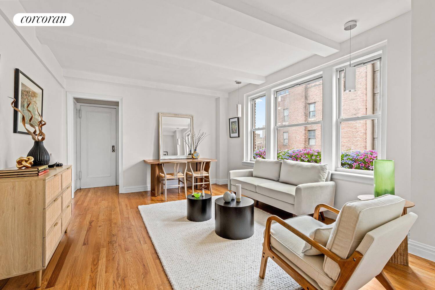 Perched on a high floor of a distinguished Fifth Avenue cooperative, this luminous one bedroom, one bathroom residence offers an elegant blend of prewar scale and thoughtful modernity.