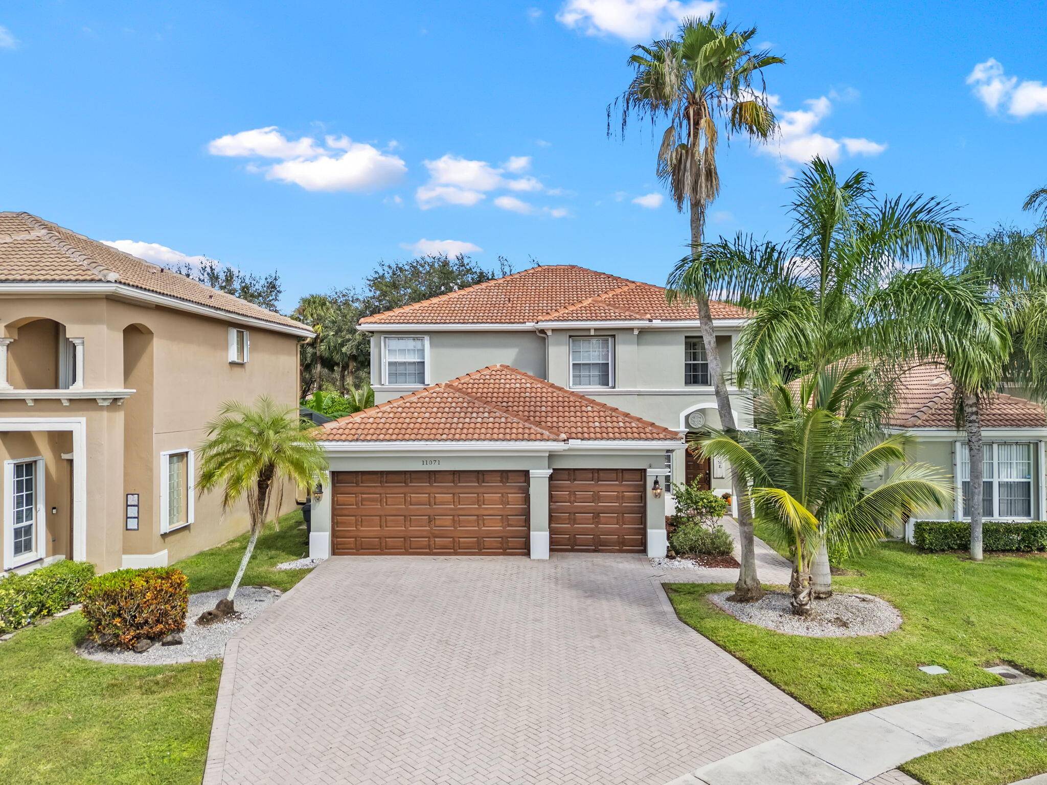 Welcome to this beautifully maintained 5 bedroom, 3 bath home tucked away on a quiet cul de sac in the desirable gated community of Wellington Shores.