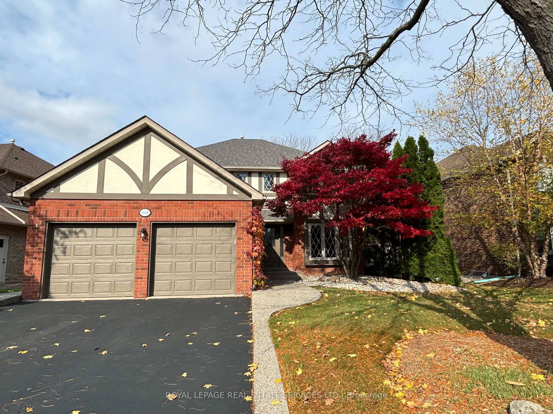 Experience luxury living in the prestigious Glen Abbey community, directly across from the world renowned Glen Abbey Golf Club.