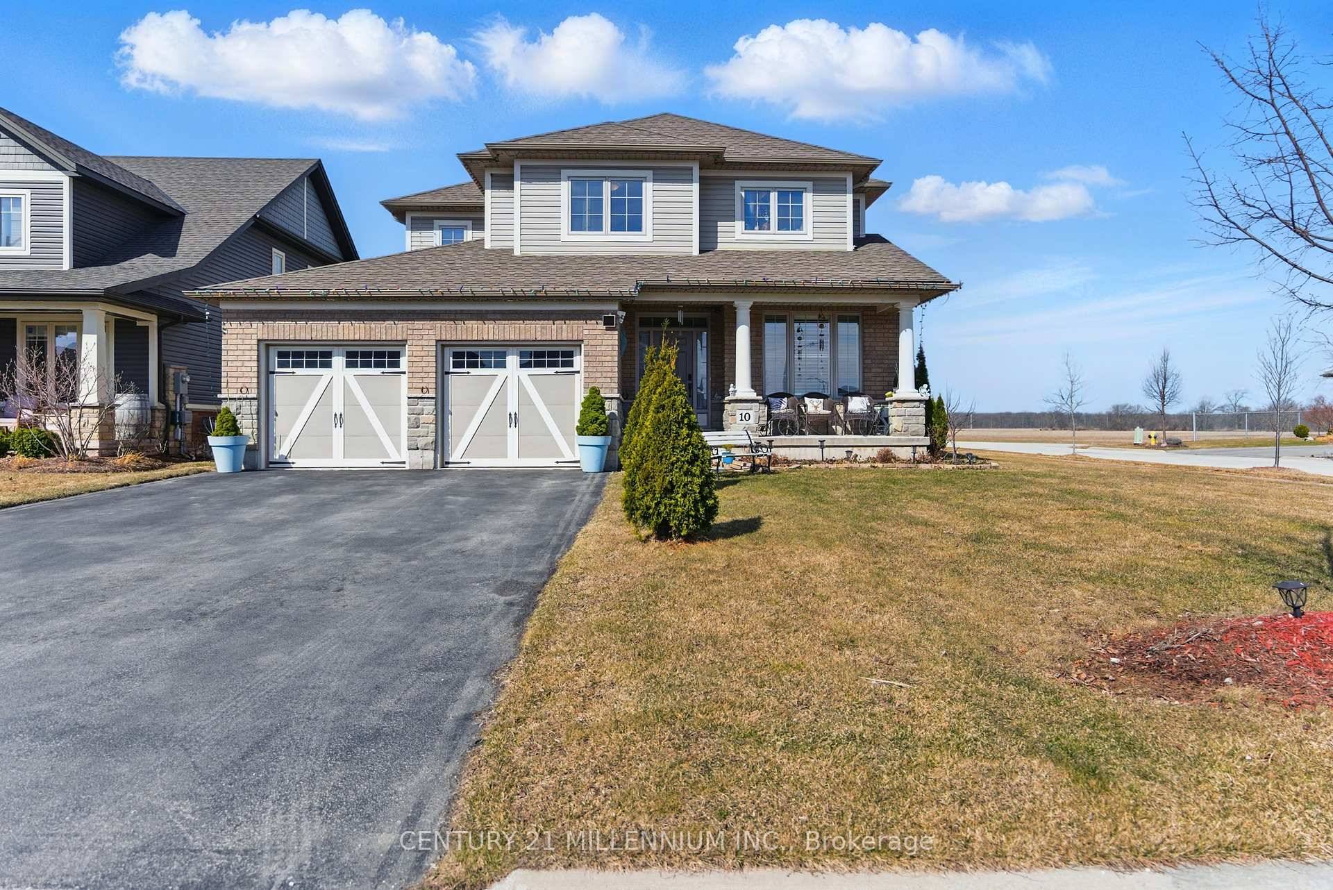 ELEGANT, UPGRADED FORMER MODEL HOME BY PHELPS HOMES ON A PREMIUM RAVINE LOT IN HARVEST HEIGHTS !