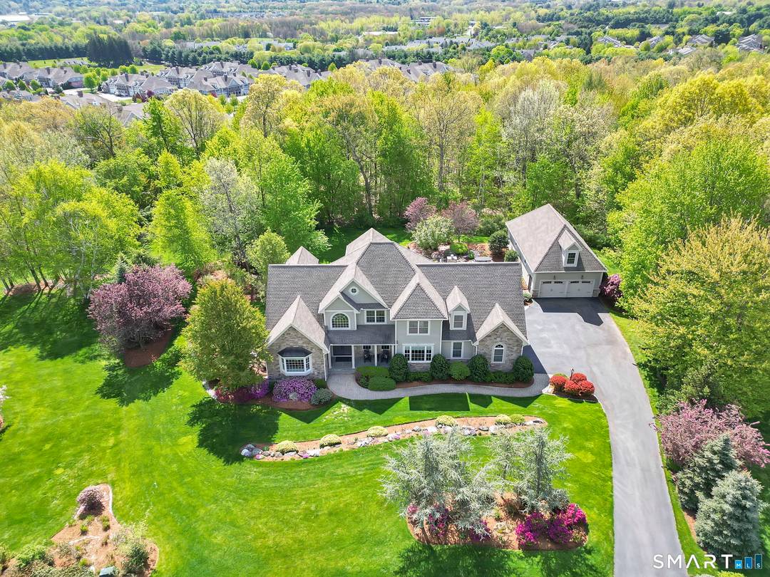 Stunning custom Santini built colonial offering 4, 271 sqr ft of luxurious living space.