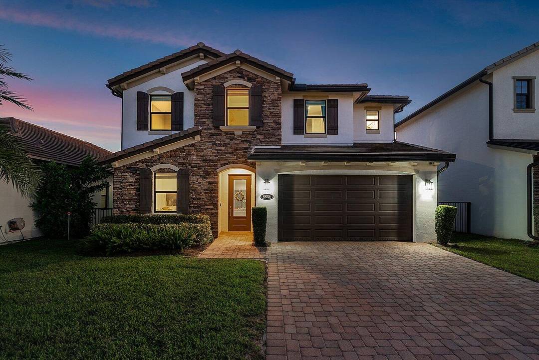 Welcome to your dream home in the prestigious gated community of Palm Meadows Estates !
