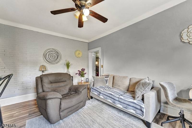 VACANT bright and spacious 2 BED, 2 BATH PENTHOUSE CONDO WITH NYC SKYLINE VIEWS and Elevator featuring a BONUS Mezzanine Loft space perfectly positioned overlooking the serene James J.