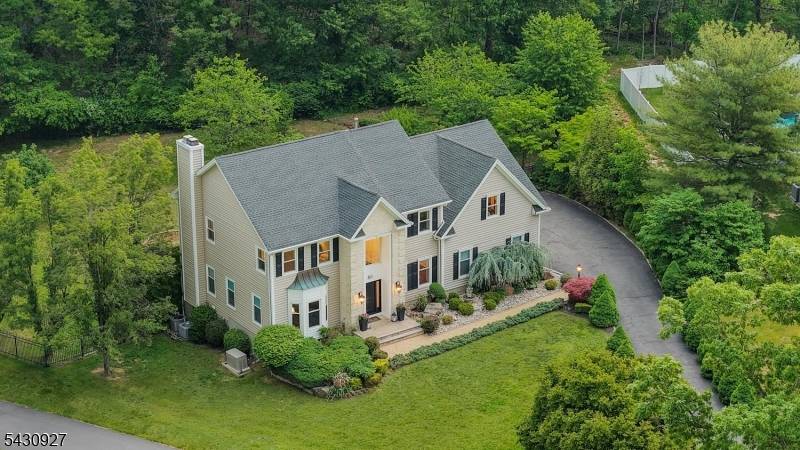 Set on an expansive, professionally landscaped.
