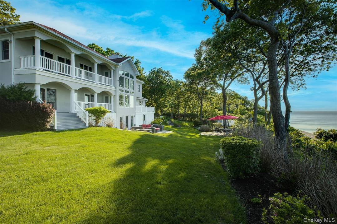 Coastal Retreat in Port Jefferson, NY Waterfront prominence with endless coastal views of Long Island Sound and the Connecticut coastline with miles of beautiful sandy beaches.
