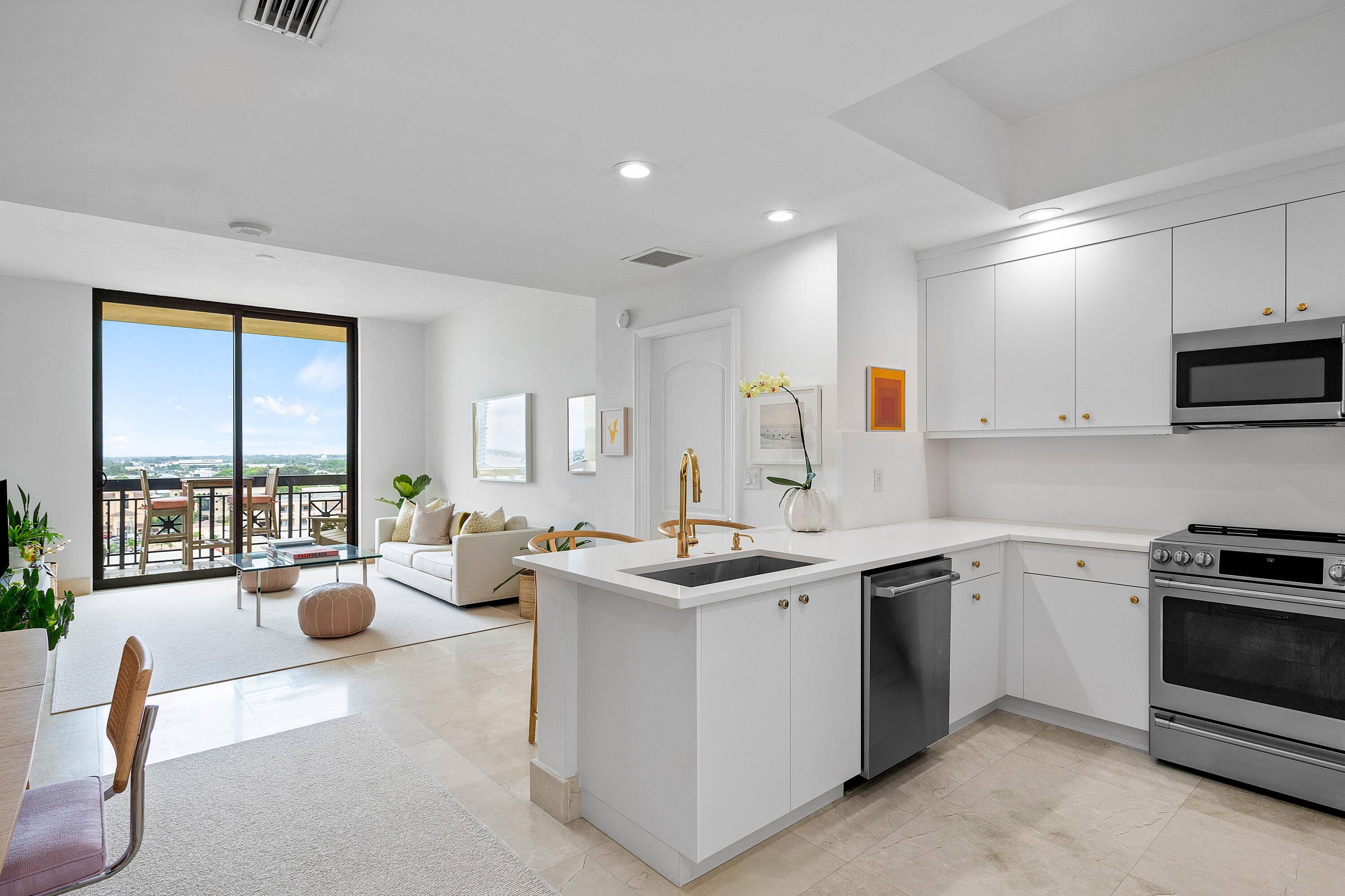 Spectacular ocean and intracoastal views from this luxury RENOVATED 2 BR southern facing condo with 2 PREMIUM SIDE BY SIDE PARKING SPACES plus extra large storage unit !