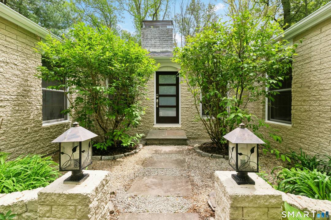 Perfectly positioned on a quiet cul de sac in the highly sought after Saw Mill neighborhood, this unique ranch with a contemporary flair and open floor plan offers a seamless ...