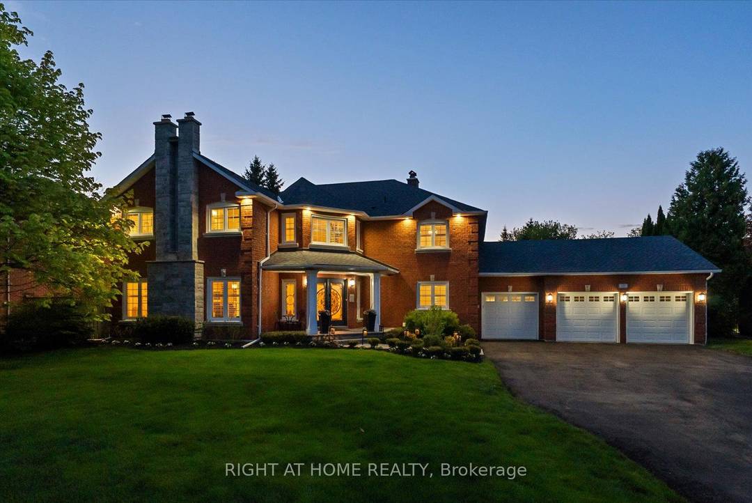 A rare half acre estate in the prestigious The Hills of St.