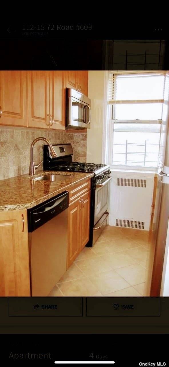 Stunning, Top Floor Co op with Partial Lake Views !