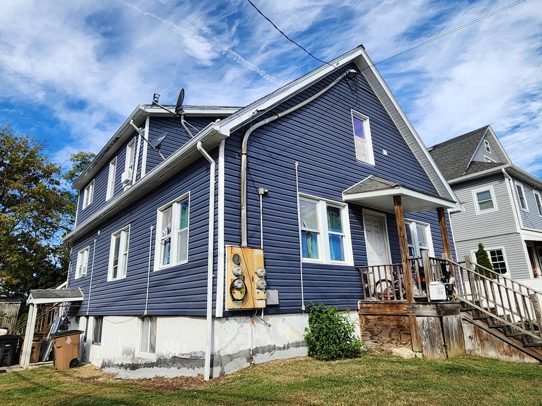 This exceptional four family house, located in a sought after Stamford neighborhood, offers a unique blend of modern luxury and investment practicality.