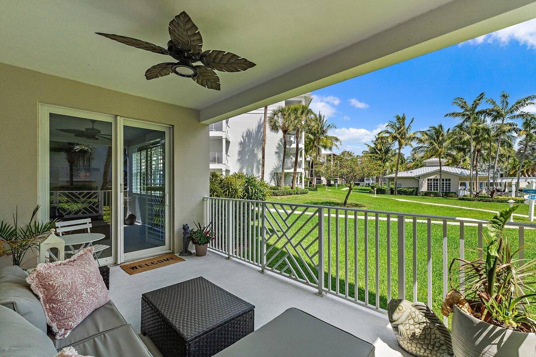 Bring your pets and your boat or keep the owner's 2021 21ft Mako to this renovated first floor residence at Bay Colony of Juno Beach.