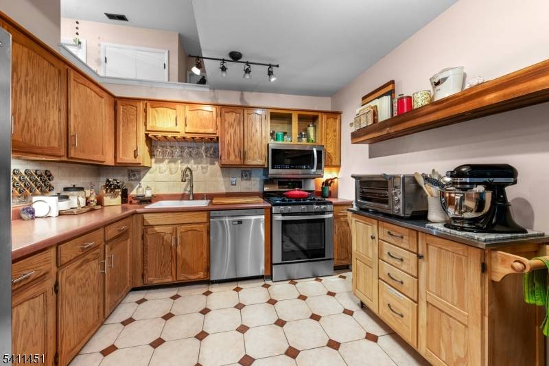 Are you looking for a multi level townhome with with many upgrades throughout, loads of storage, here in West Milford ?