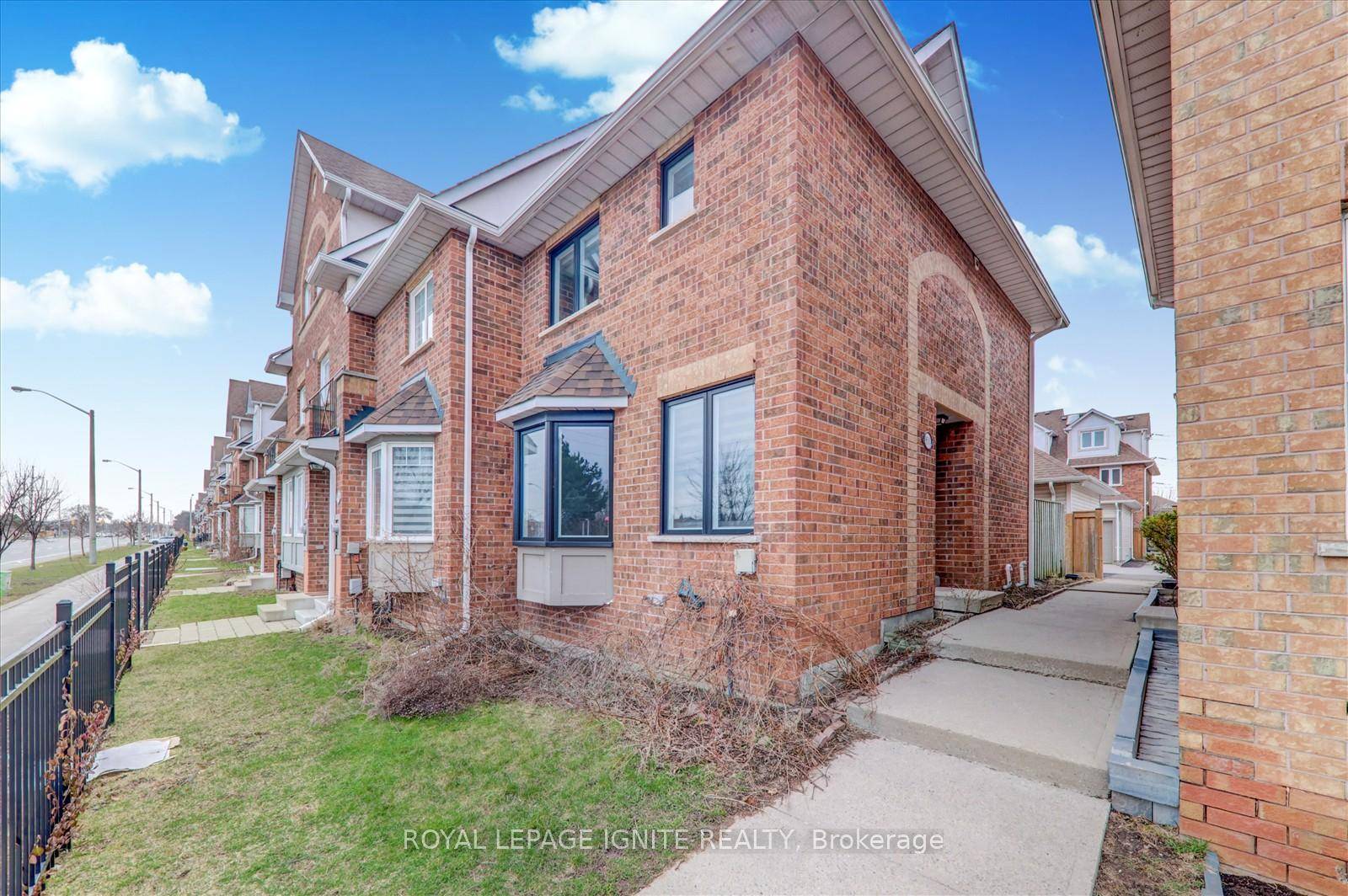 Why settle for a condo when you can own this beautifully updated townhouse with separate garages and tons of storage ?