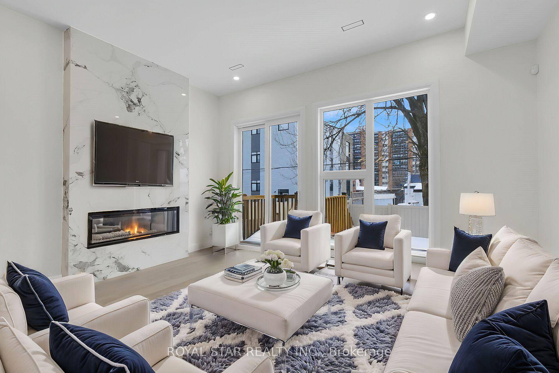 This contemporary end unit townhome is 2211 Sq Ft.