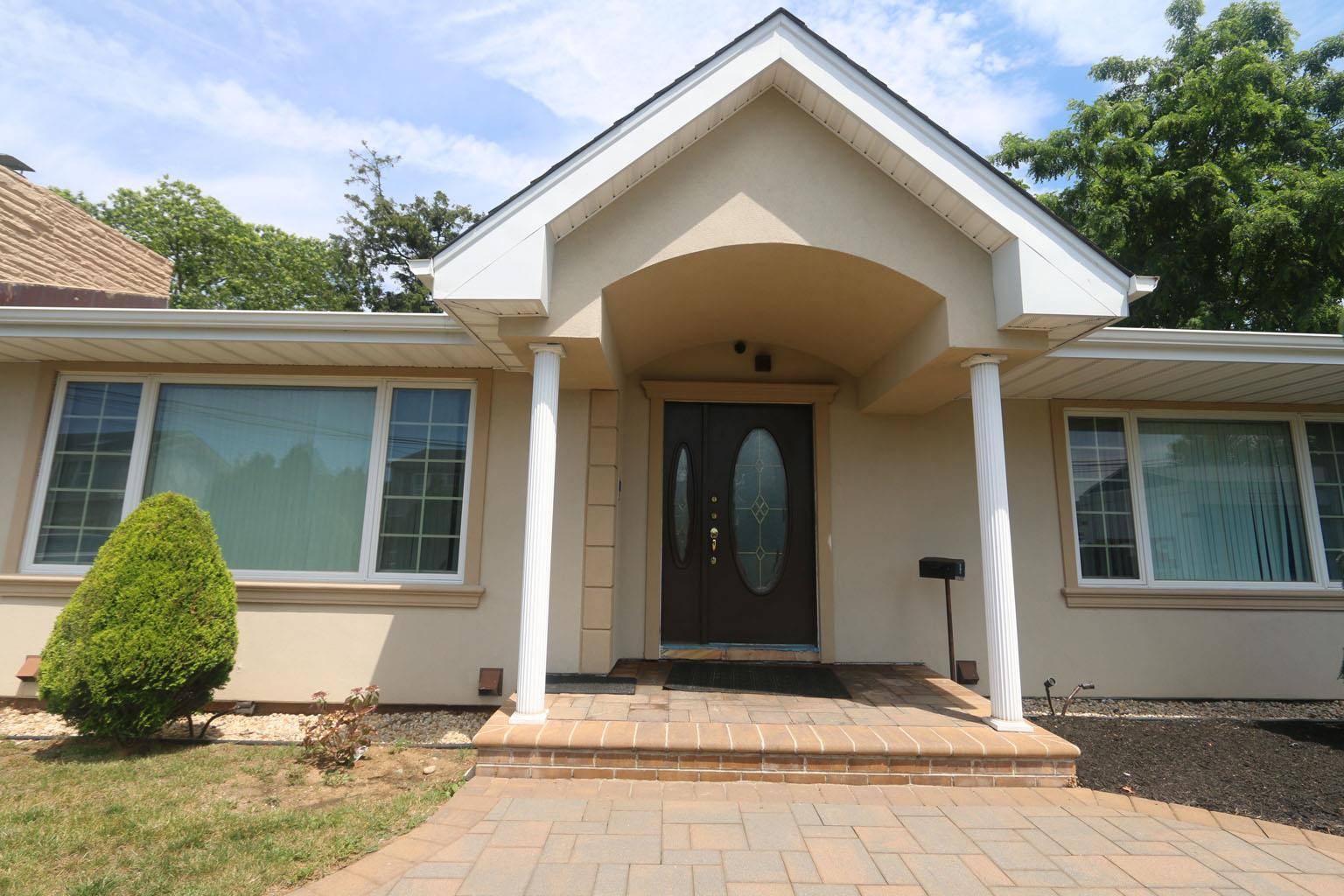 Beautifully maintained and spacious home featuring a brand new kitchen, central air, French drain, and much more.
