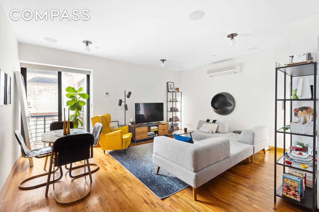 Rarely available 2BR 2BA southern facing Duplex with a Private Roof Deck and Private Balcony in DUMBO !