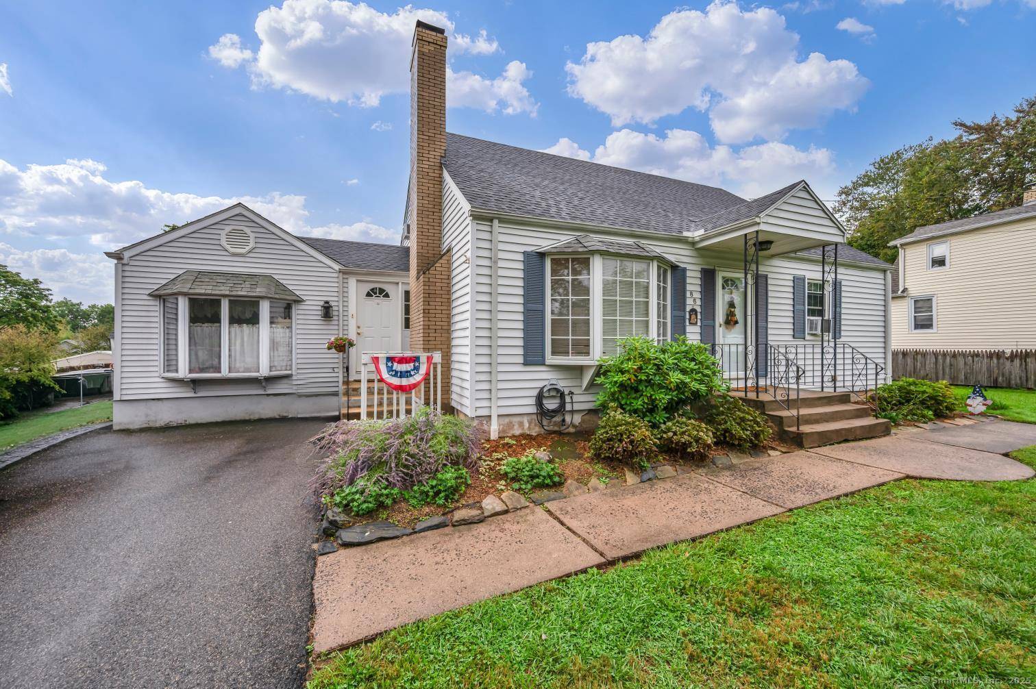 FALL in love with this beautifully maintained Cape Cod in the heart of Wethersfield !