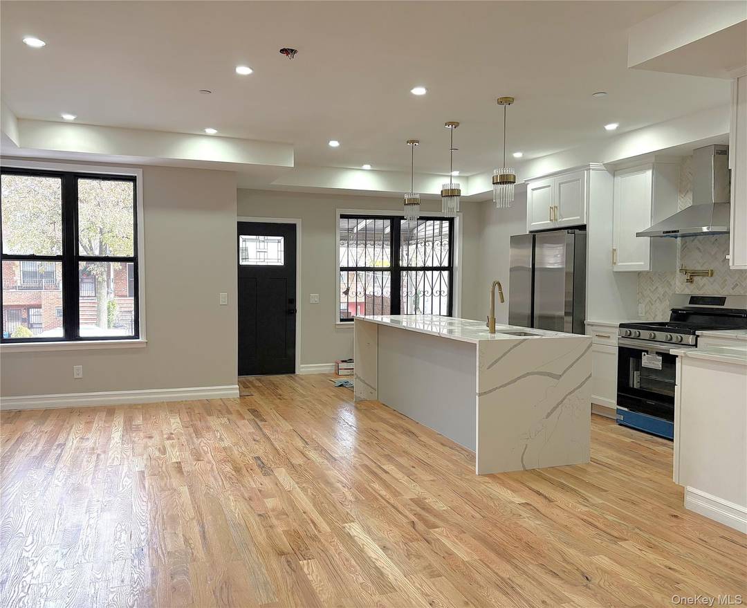 Experience modern luxury in this fully renovated two family brick home in East Flatbush.