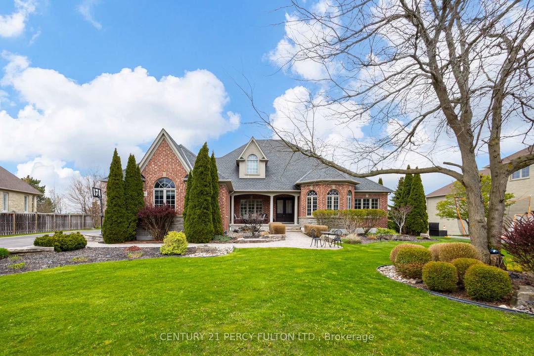 An exceptional custom built bungalow by Andelwood Homes, set within the prestigious Chateaus of Wilson House Drive in the quiet hamlet of Ashburn.
