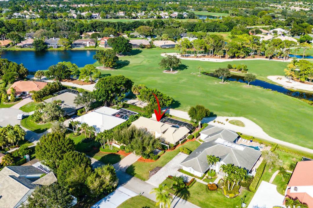 Marlwood Estates at PGA National, this residence enjoys one of the community's most coveted advantages an unobstructed, panoramic golf course view with no homes directly behind it.