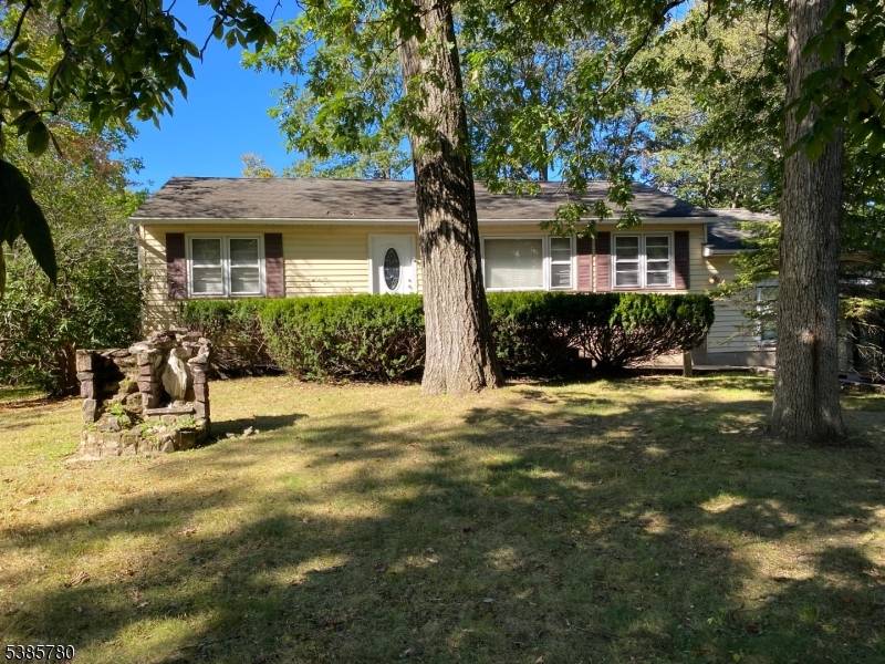 Oversized ranch features 3 bedrooms, 2 full baths, full basement, 3 car detached garage, enclosed rear porch, parking for 8 cars.