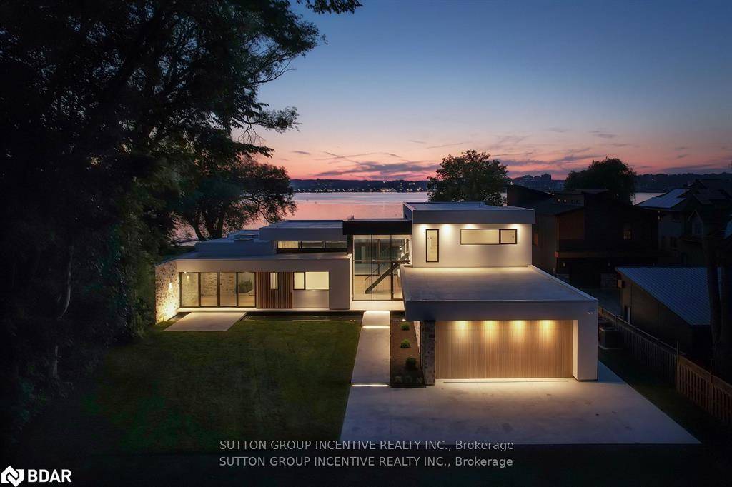 Beach front home with exquisite waterfront views and the most exceptional sunsets !