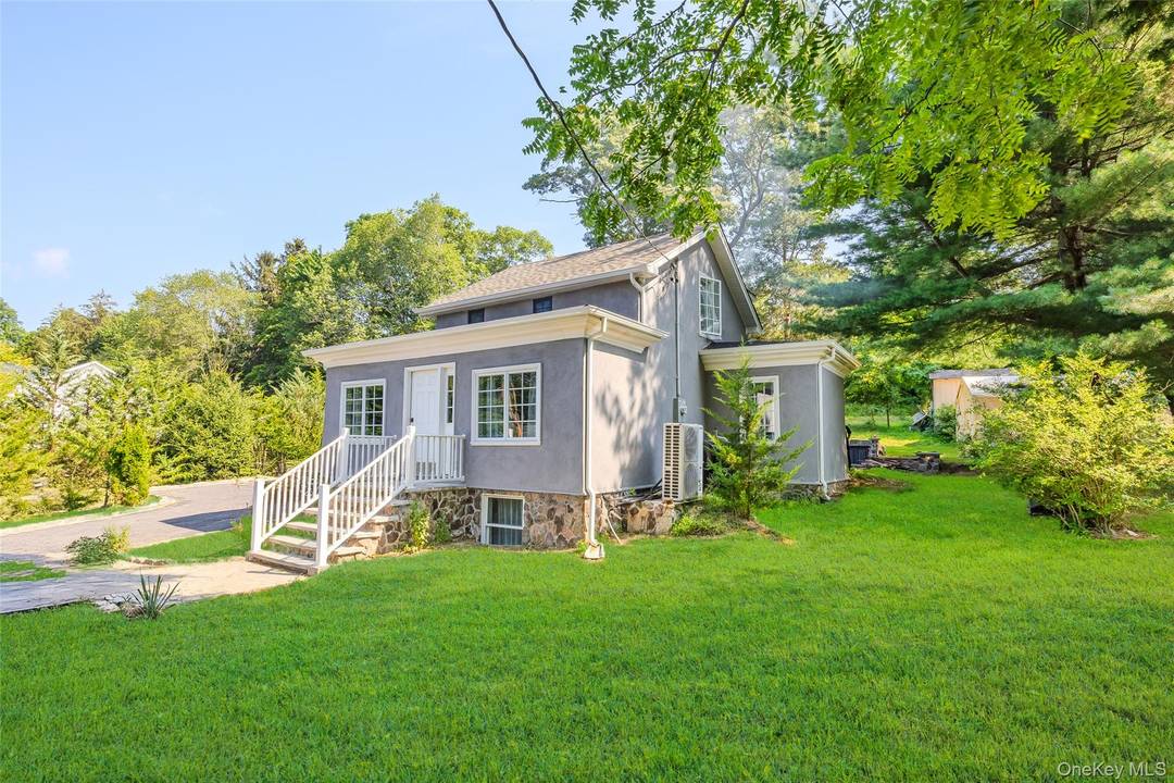 Welcome to this beautifully renovated Cape Cod style home nestled in the heart of Rocky Point offering beach rights perfect for year round or summer getaway.