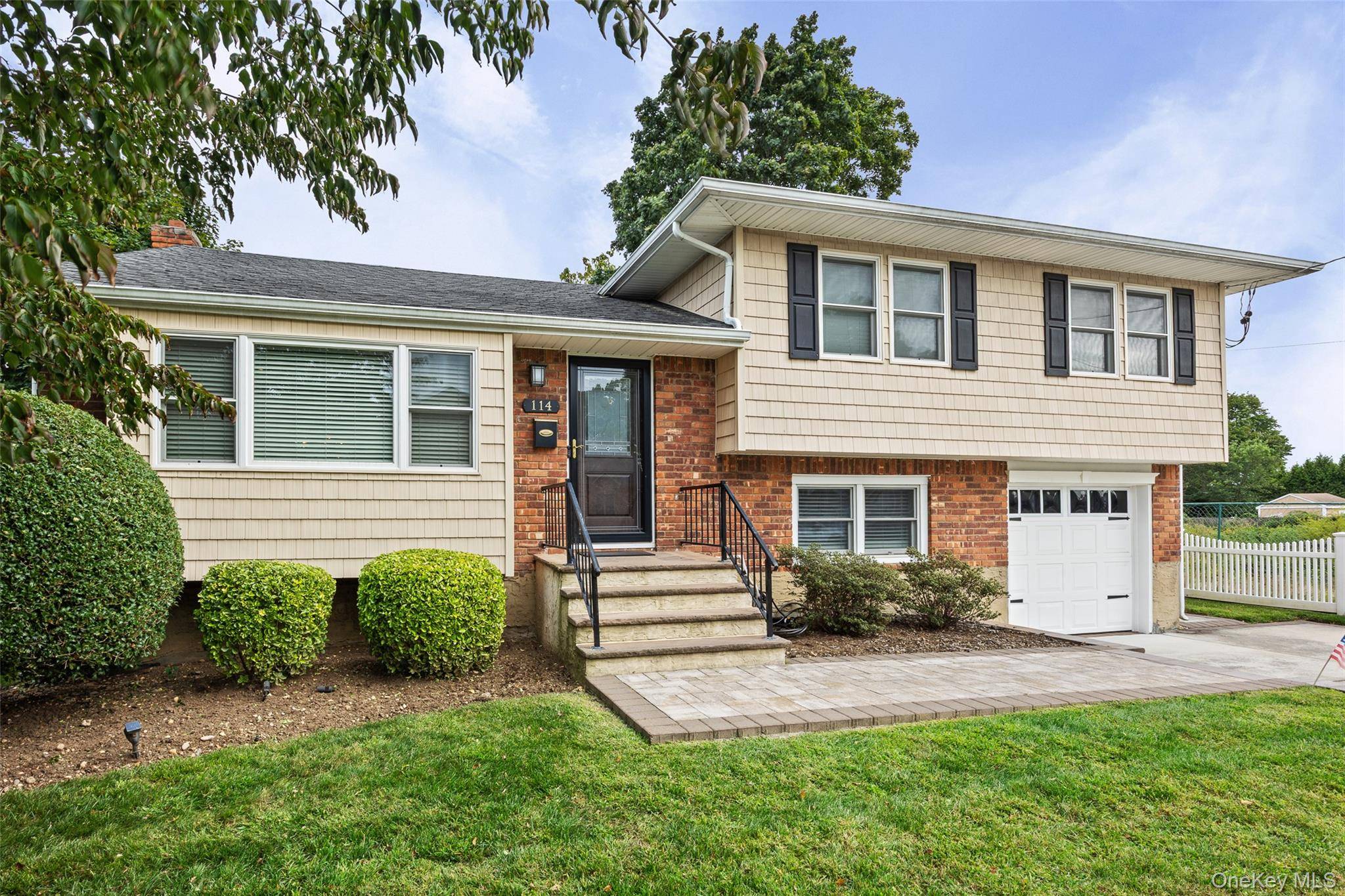 Welcome to 114 Spruce Avenue in the very desirable neighborhood of Bethpage.