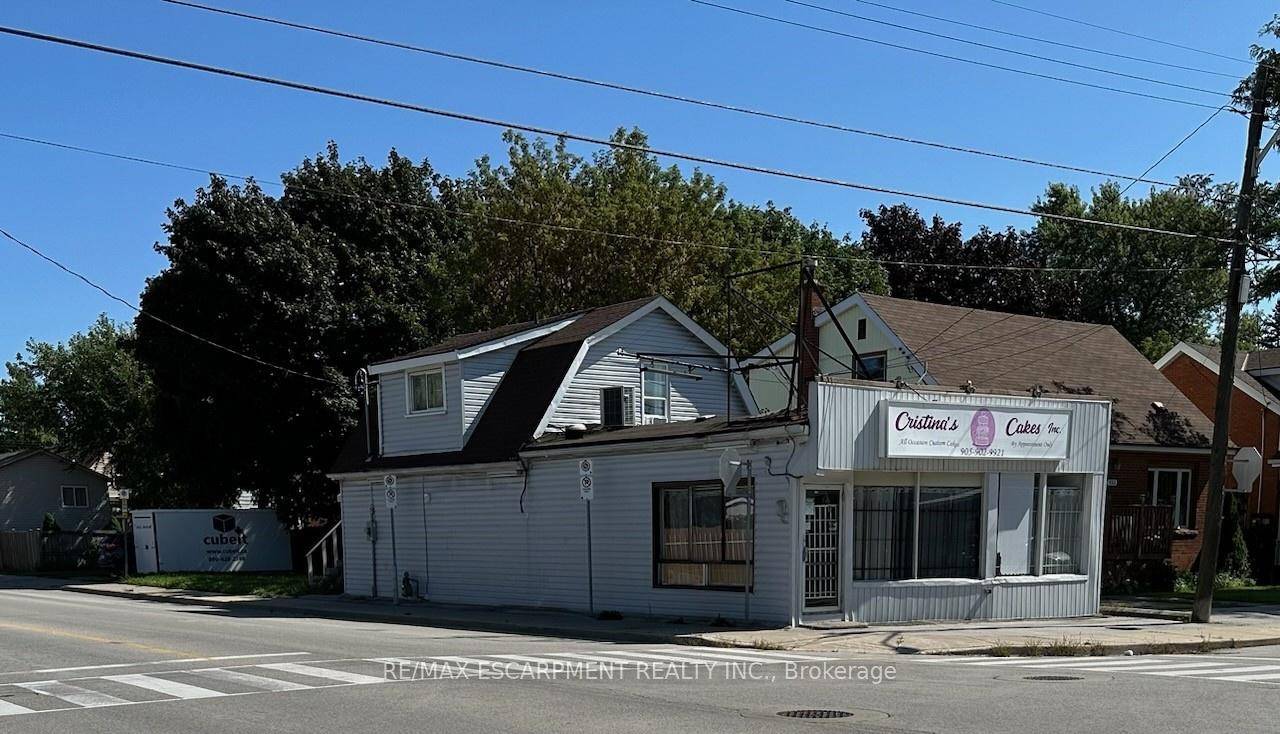 On Hamilton Mountain perfect opportunity on Hamilton Mountain to purchase an updated building with separate apartment and established business over 20 years.