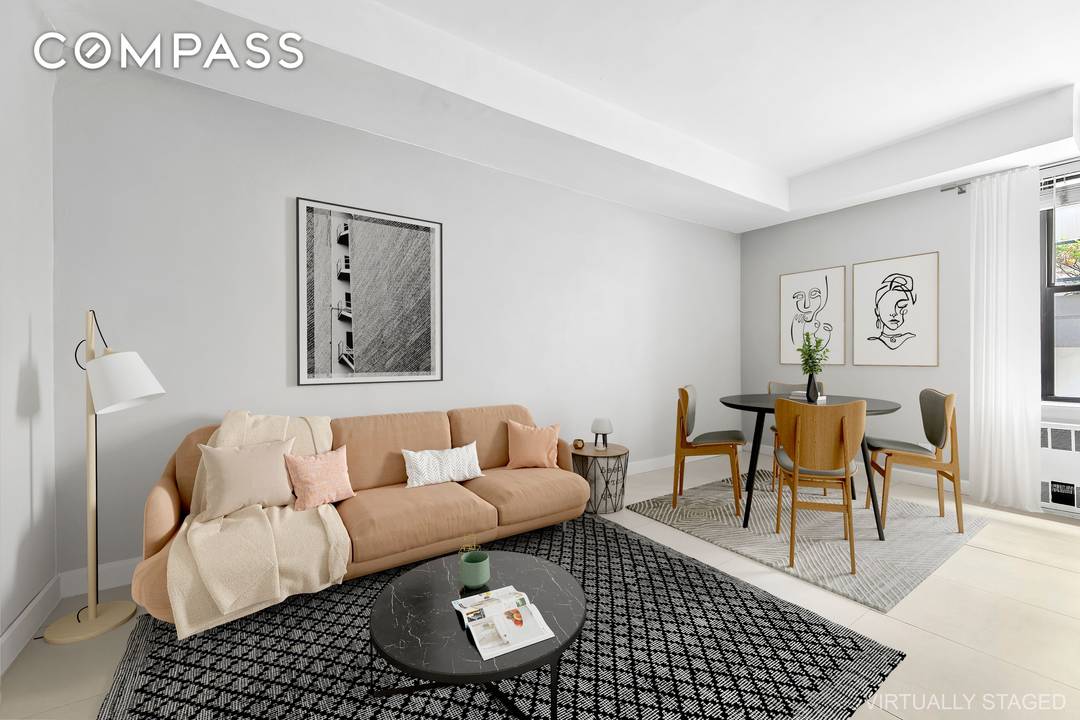 Charm abounds in this beautifully renovated, move in ready one bedroom, two bathroom duplex residence.