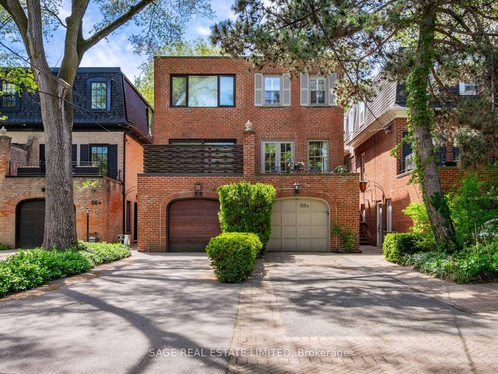 Tucked into the leafy calm of South Rosedale, this stately brick home is a study in quiet luxury.