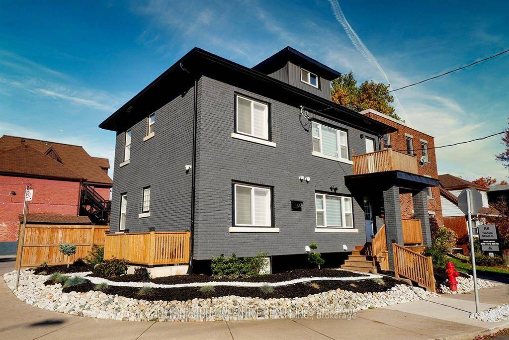 Welcome to 88 Tisdale, an INVESTORS DREAM Cash Flow Positive LEGAL 4 PLEX in Hamilton !