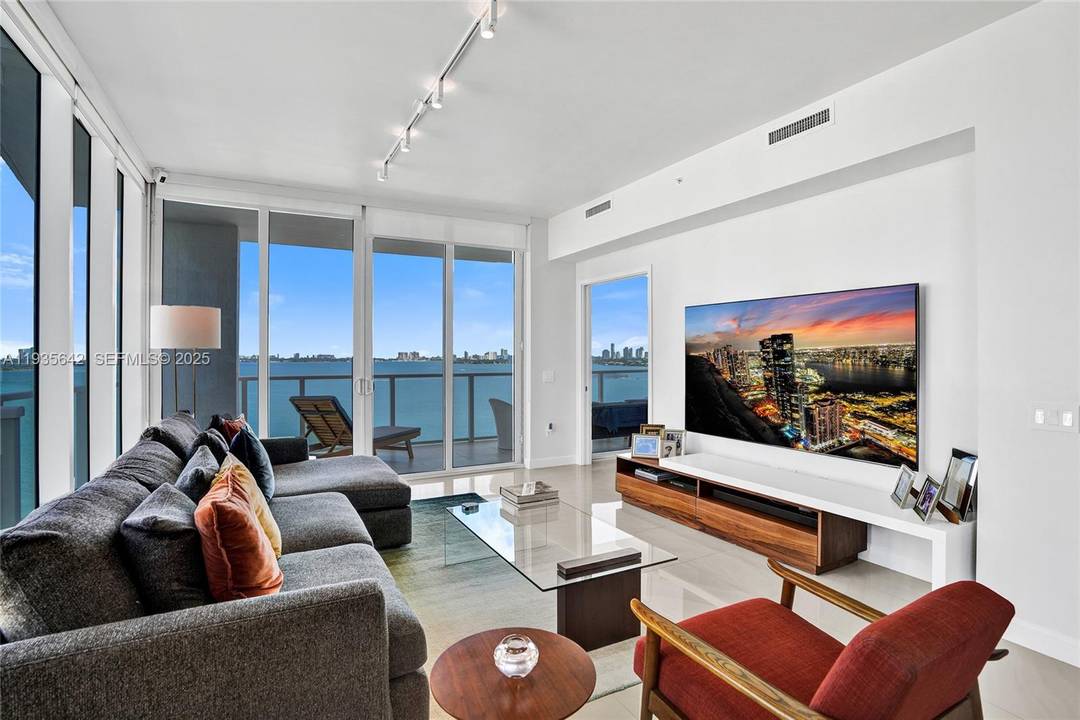 Spacious 2 Bedroom, 2 Bath in a boutique Bay front building with soaring ceilings, breathtaking Bay view and exclusive boardwalk access next to a scenic dog park.