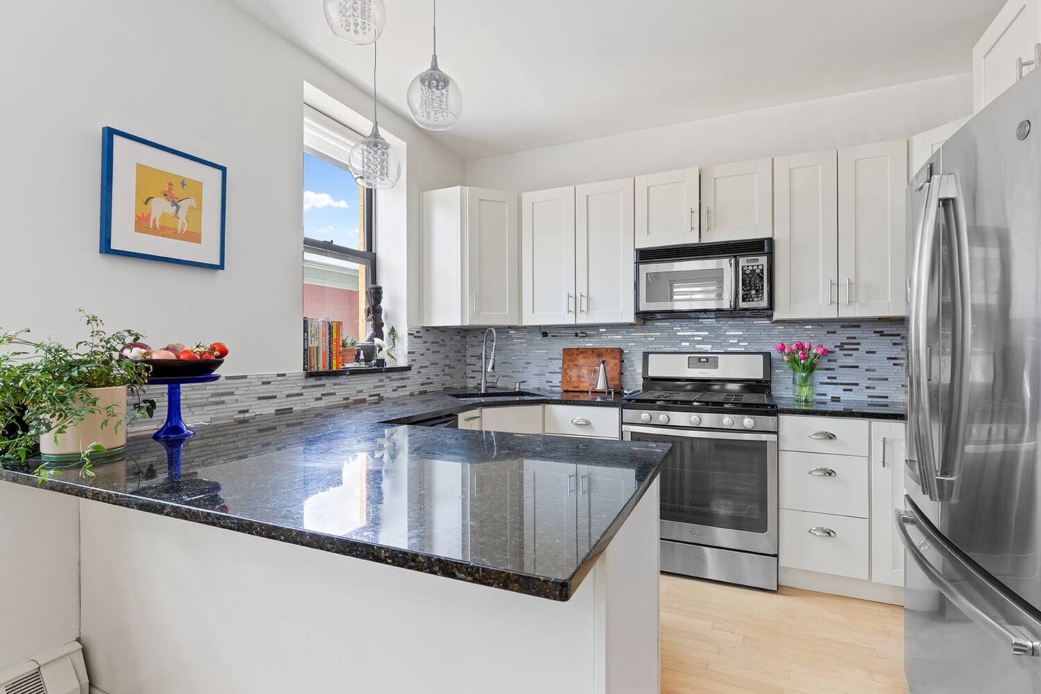 This bright and airy two bedroom, two bathroom condo is perched in a beautifully converted industrial building, offering soaring 9 foot ceilings, oversized windows, and your own private rooftop terrace ...