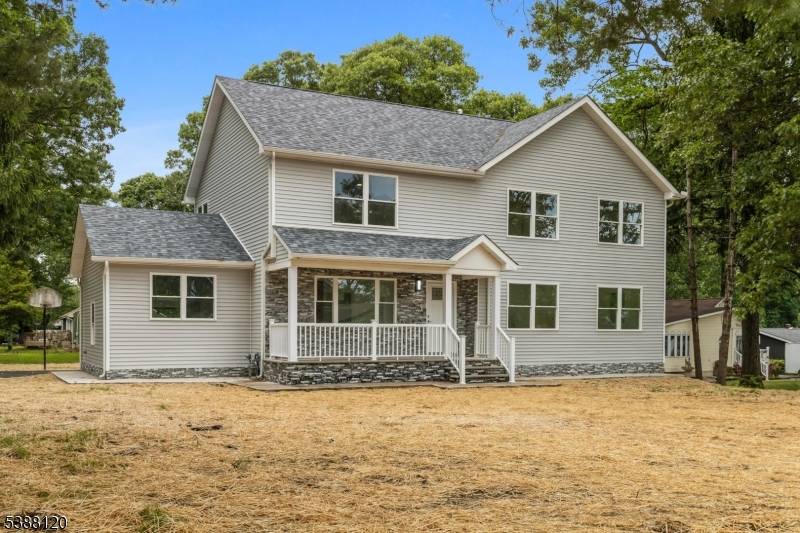 This newly renovated and expanded Colonial style residence offers 4 bedrooms, 3 full bathrooms, and a flexible additional room on the first floor that may be used as a home ...