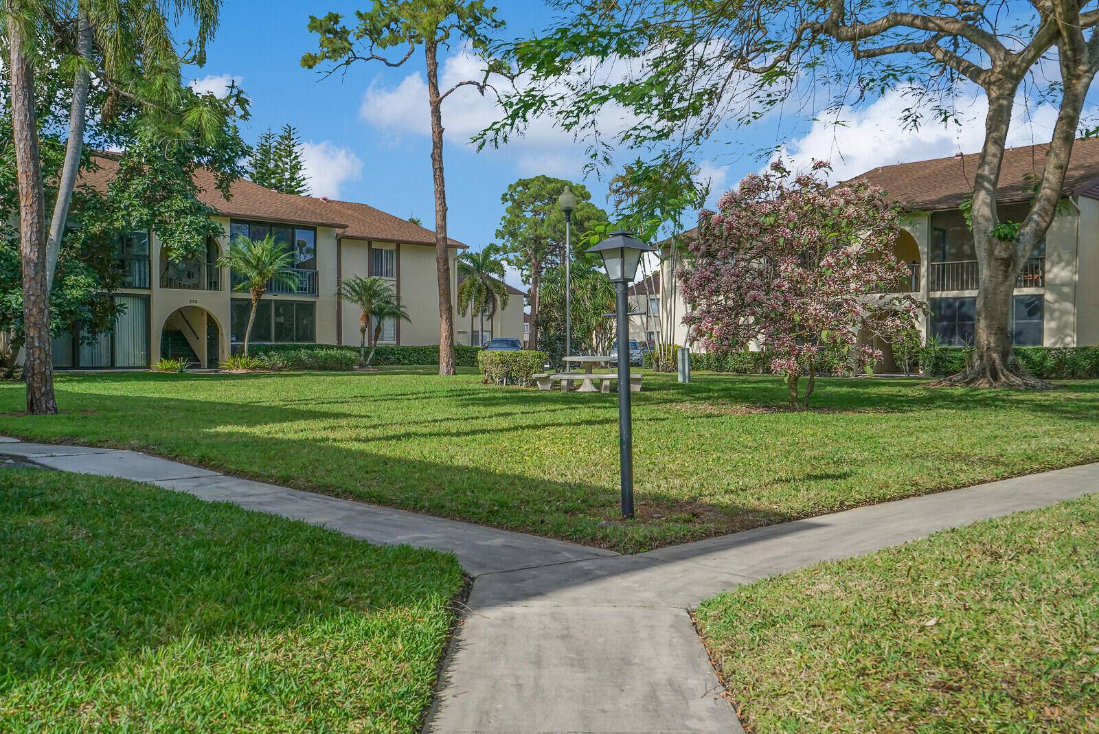 Welcome to this inviting fully furnished 2 bedroom, 2 bathroom first floor condo with a wide open floorplan.