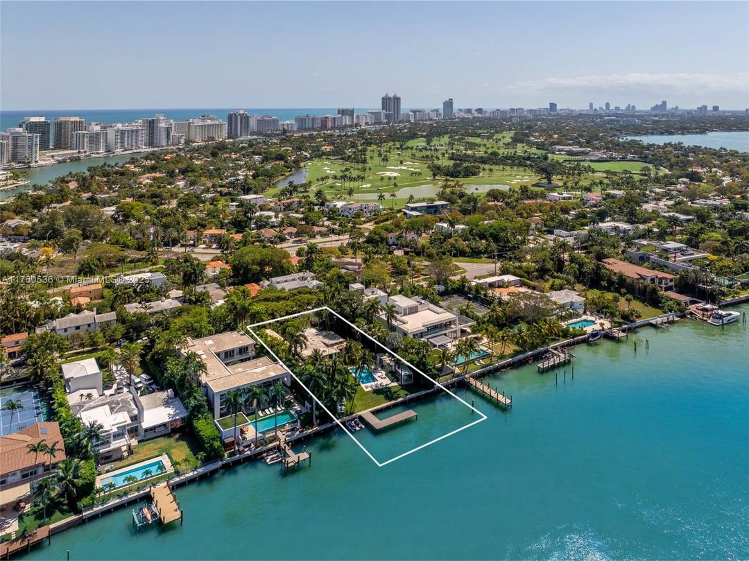 Step into this breathtaking waterfront sanctuary on prestigious North Bay Road.