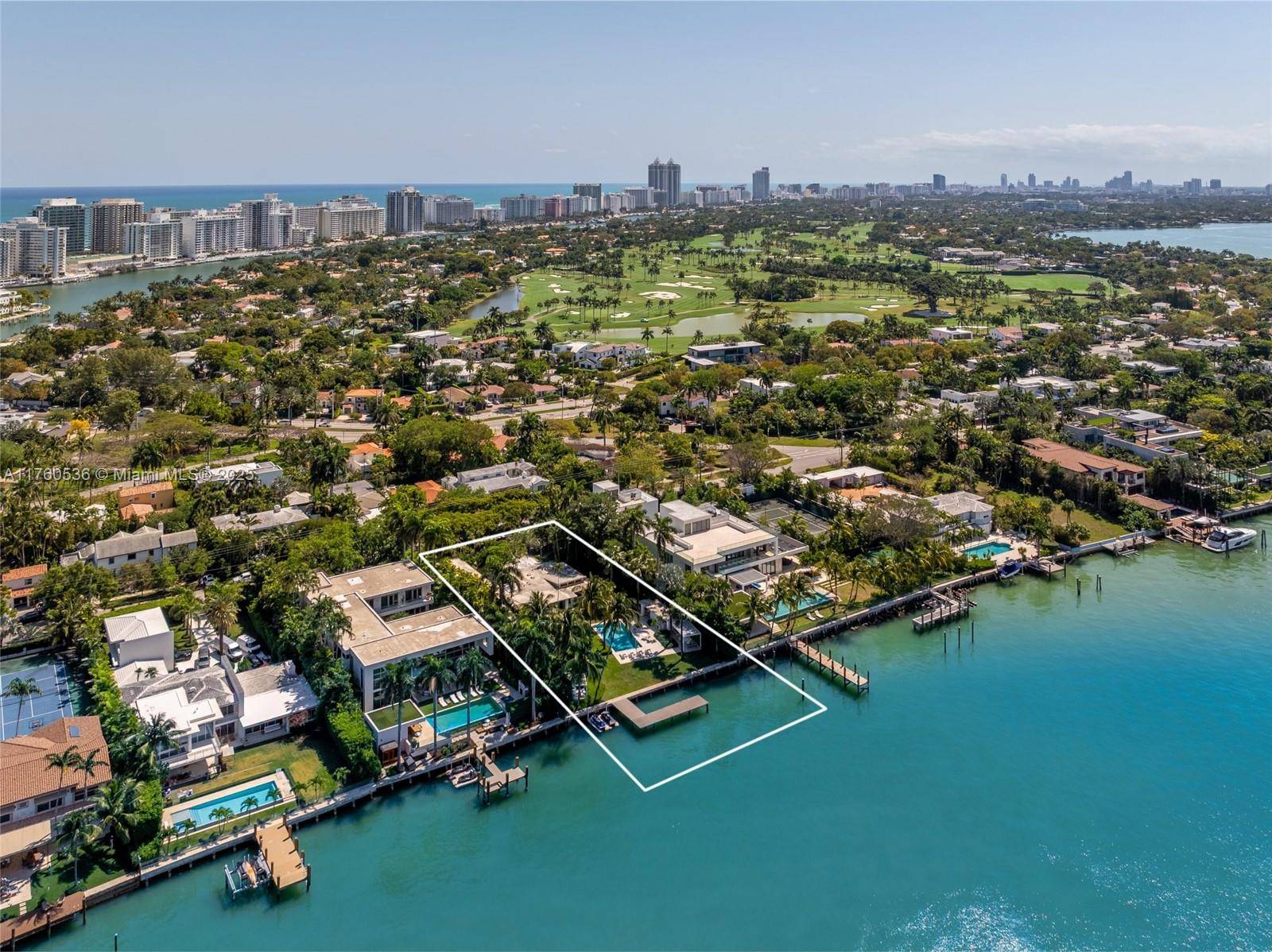 Step into this breathtaking waterfront sanctuary on prestigious North Bay Road.