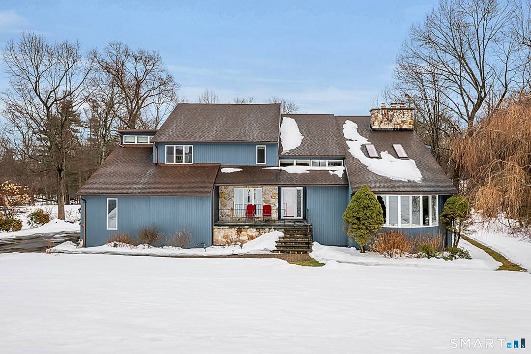 This home is located in the Blue Hills section, in a neighborhood known for unique, thoughtfully designed homes.