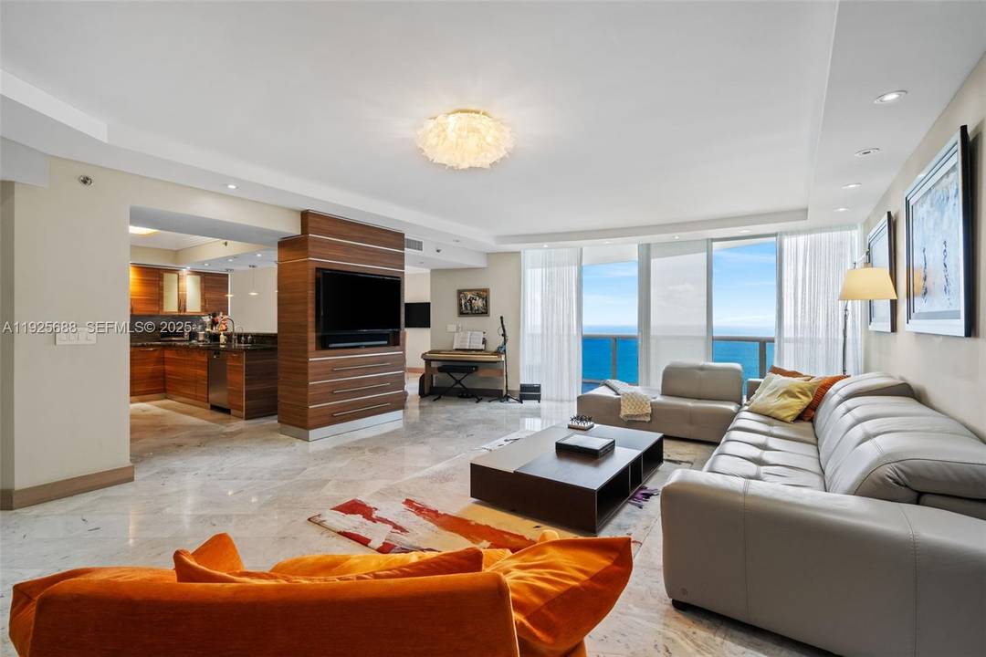 Experience luxurious oceanfront living in this beautifully upgraded 3 bedroom, 3.